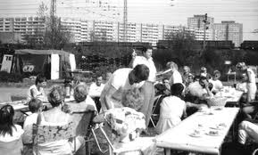 Members of the Allotment Garden Colony "Carefree" meet for a group meal in Marzahn, Berlin in the early 1980s. This garden was created on the edge of the GDR's largest 'socialist suburb' as part of the government's attempts to address persistent produce shortages (Thanks to Kleingarten e.V. "Sorgenfrei" for permission to reproduce this photo here.)
