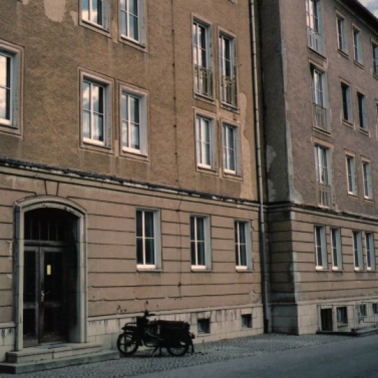 Frau K's building in WK I; note the GDR-era moped parked next to entrance (photo: author)
