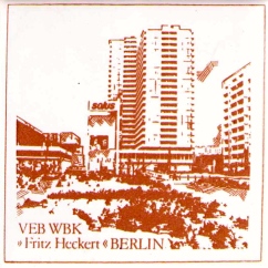 A souvenir ceramic tile presented to members of the "Fritz Heckert" People's Own Housing Construction Combine (photo: author).